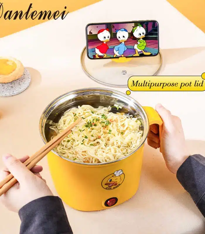 Mini rice cooker for small spaces, compact and energy-efficient for quick meals.